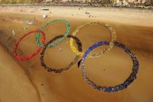 As London prepares to host the 2012 Games, the first Olympics world record has been set on Merseyside, by pupils forming the iconic rings.
