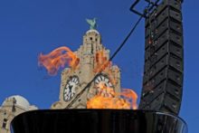 The Olympic Torch made a colourful and emotional stop in Liverpool as it made its way to Merseyside en route to the Games in London.