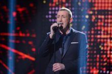Liverpudlian singer Christopher Maloney is through to the quarter-finals of X Factor as one huge act goes home.
