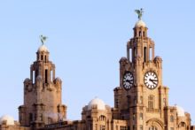 Liverpool's iconic waterfront landmark, the Royal Liver Building, has been sold in a deal worth £48m.