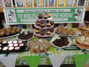 A display of cakes donated to Bebington Central Library © Maria Byrne
