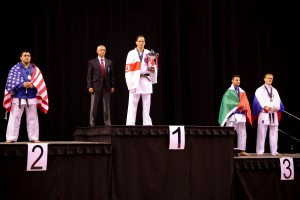James McGorian on the podium after winning the individual Kumite world title