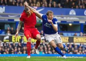 Everton's Nikica Jelavic in action against Liverpool's Daniel Agger during the 219th Merseyside derby match at Goodison Park last year. (Pic by David Rawcliffe/Propaganda)