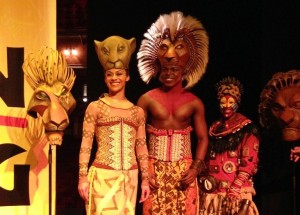 The Lion King cast of Ava Brennan, Nicholas Nkuna and Gugwana Dlamini in Liverpool