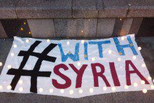 A vigil was held outside Lime Street Station to mark the third anniversary of the Syria uprising.