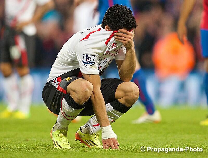 Luis Suarez was distraught after Liverpool blew a three-goal lead at Crystal Palace. Pic © David Rawcliffe/Propaganda