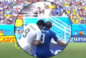 Luis Suarez appears to bite Giorgio Chiellini © BBC Sport