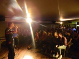 Drama student Ryan Byrne performing to the audience. Pic © LJMU Comedy Society