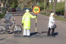 Parents in Knowsley are fighting to save their lollipop men and ladies as six school crossing patrols could be axed.