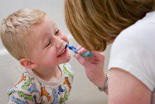 A leading Liverpool academic accuses the government of a “cop-out” over children’s dental hygiene guidelines.