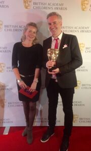 LEGO bosses Hilary Plummer and Matthew Ashton collecting BAFTA award © Matthew Ashton  
