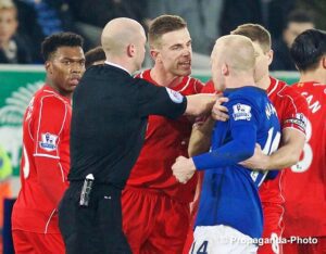 Tempers flare in the Merseyside derby at Goodison Park. Pic © David Rawcliffe / Propaganda Photo