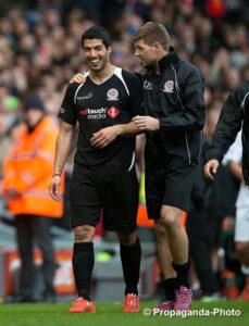 Luis Suarez with Steven Gerrard after the All-Star Charity Game at Anfield. Pic © David Rawcliffe / Propaganda Photo