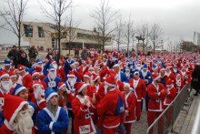 The city centre was a festive sea of red with a splash of blue as around 7,000 turned up to take part in the 2015 Liverpool Santa Dash.