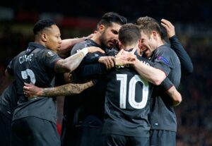 Liverpool celebrate Philippe Coutinho's Europa League away goal against Manchester United at Old Trafford. Pic © David Rawcliffe / Propaganda Photo