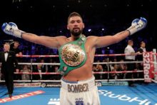 Liverpool's Tony Bellew beat BJ Flores in the third round to defend his WBC World Cruiserweight title at the Echo Arena.