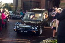 More than a thousand mourners lined streets in town and attended the funeral service of celebrity hairdresser, Herbert Howe.