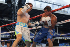 Stephen Smith (left) in action against Daniel Brizuela at Goodison Park in May. Pic © Lawrence Lustig Matchroom Boxing