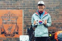 A devoted Liverpool supporter cycled all the way from South Korea to see their Anfield stadium.