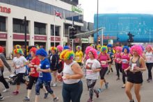A sea of retro Liverpool 80s-style perms were on show as thousands took part in the Echo Scouse 5k fun run.