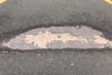 Wirral Council is spending £1.4m fixing the worst roads in the borough but a pothole campaigner claims it is not enough.