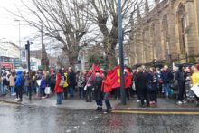 International Women's Day brought over 100 protesters together outside the Bombed Out Church.