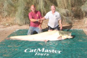 Bernie Campbell (right) with his record breaking catch. Pic © Bernie Campbell/Facebook 