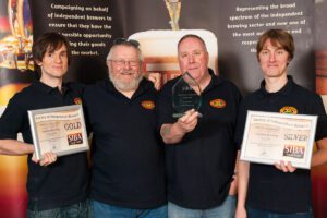 Left to right, Mark Powel, Harry Cobot, Steve Briscoe and Alex Morley celebrating the award. ©PeerlessBrewingCompany