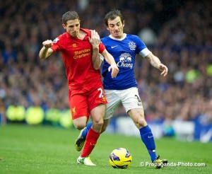 Liverpool's Joe Allen in action against Everton's Leighton Baines during the 219th Merseyside Derby match at Goodison Park last year. (Pic by David Rawcliffe/Propaganda)