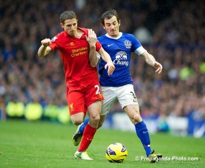 Liverpool's Joe Allen in action against Everton's Leighton Baines during the 219th Merseyside Derby match at Goodison Park last year. Pic © David Rawcliffe/Propaganda