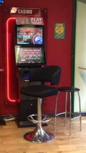 A fixed odds gambling machine in a betting shop.
