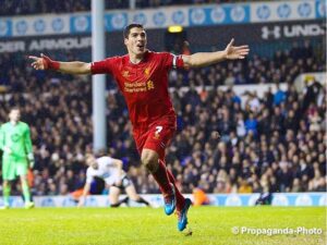 Luis Suarez celebrates scoring against Tottenham. Pic © David Rawcliffe / Propaganda