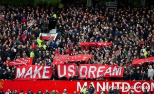 Liverpool fans at Old Trafford dreaming of Premier League title glory. Pic © David Rawcliffe / Propaganda