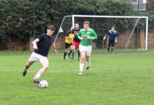 Jack Maguire (left) and Bart Kalanski (far right in goal) combined to deny the Alumni an equaliser
