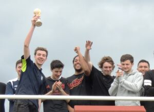 Captain Nick Seddon lifts the JMU Journalism World Cup aloft after Level 3 won the 2014 final. Pic by Roisin Brehony