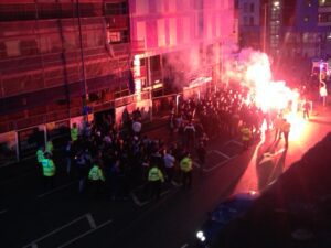 Besiktas fans lit flares as they marched around town before their Europa League match against Liverpool. Pic by Olivia Swayne Atherton © JMU Journalism