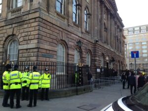 A small number of police officers stood outside at the Town Hall but no protests were held ahead of the council's budget meeting. Pic © Connor Dunn / JMU Journalism