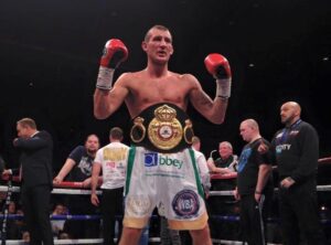 Derry Mathews celebrates after winning the interim WBA lightweight world title. Pic by Sean Purvis / JMU Journalism