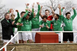 The Alumni celebrate after winning the 2015 JMU Journalism World Cup Final. Pic © Craig Galloway