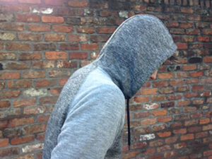 There is now a ban on hoodies covering faces in parts of Sefton.