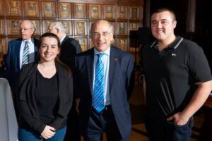 JMU Journalism students Christy Jade Biggar (left) and James Knowles (right) with Chancellor Sir Brian Leveson (centre). Pic © LJMU 