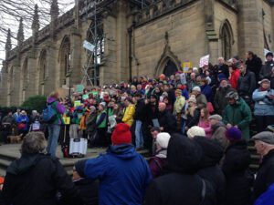Activists gather outside the Bombed Out Church, St Luke's for the climate change march. Pic by Barry Rocks © JMU Journalism 