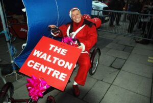 Celebrity Haidresser Herbert Howe at the Liverpool Santa Dash 2015 run through the city centre. Pic by Rochelle Beighton © JMU Journalism