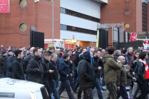 Liverpool supporters leave Anfield in protest against new ticket prices in the 77th minute against Sunderland. Pic by Connor Lynch © JMU Journalism