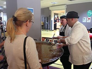 Hospital catering staff serve Scouse to staff, patients and fundraising supporters. Pic © JMU Journalism