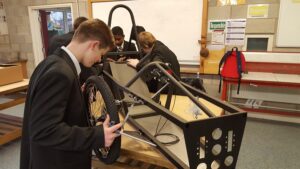 St Margaret's Academy pupils working on their eco-car. Pic © St Margaret’s Academy