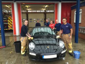 Firefighters in action for charity © FireFighter charity