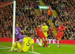 Adam Lallana scores the third goal for Liverpool against Villarreal. Pic © David Rawcliffe / Propaganda Photo