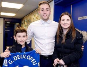 Ceberal palsy victim George Shaw with Everton star Gerard Deulofeu and George's sister Olivia. Pic © David Shaw
