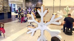 Artists work on snowflakes for the trail Pic © Andrew Evans